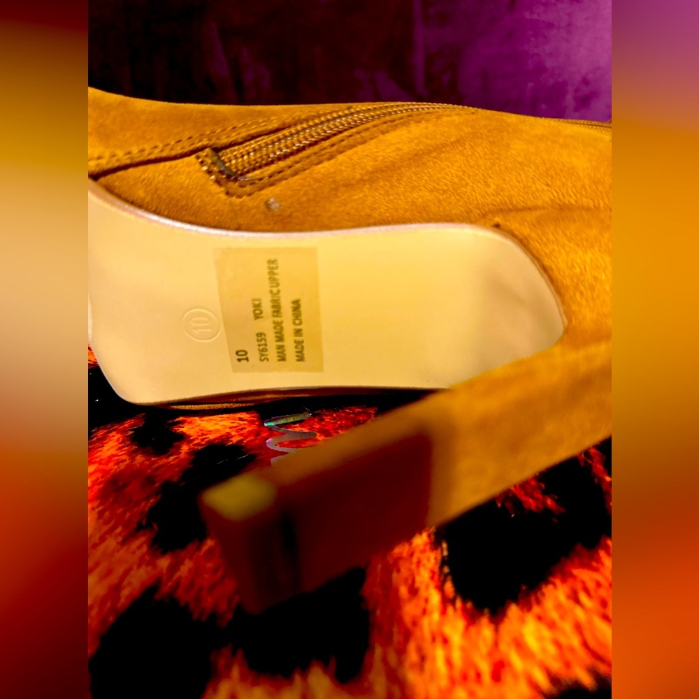 Camel heeled fashion boots. Paid $75 originally. Asking $35. Never worn.